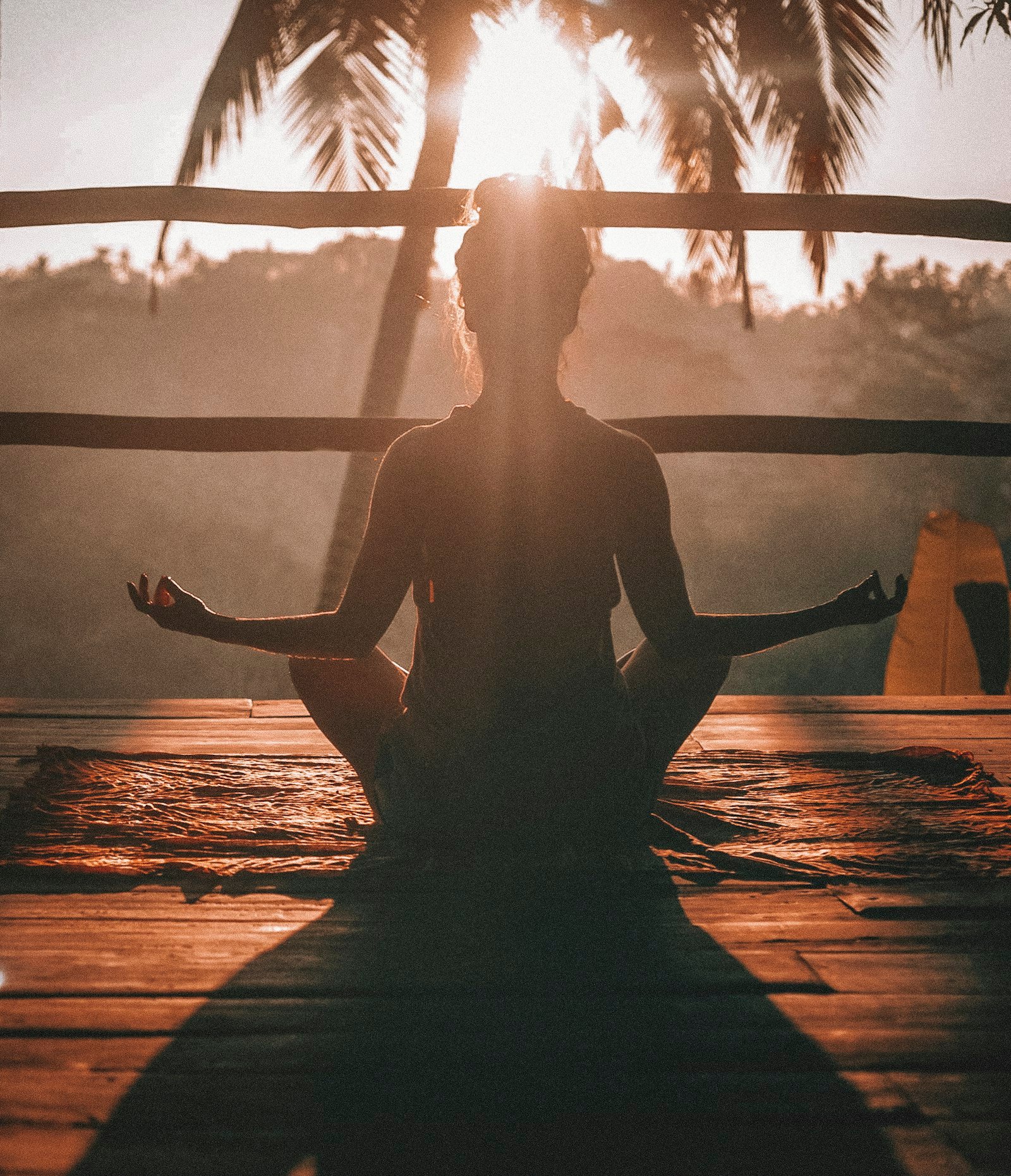 Woman practising yoga and meditation for mental peace